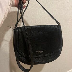 Pebbled leather Kate Spade bad with pink suede interior. Gold hardware